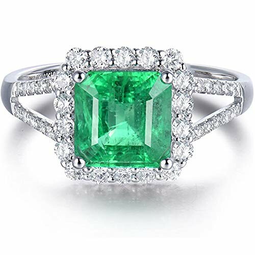 Emerald and diamond ring with square-cut green stone.