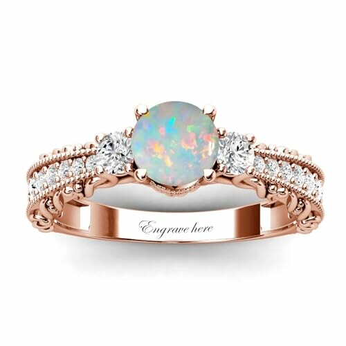 Rose gold ring with opal and diamonds