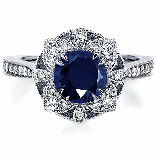 Sapphire and diamond ring with intricate design